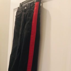 Classic black jeans w/ a red stripe on each side!